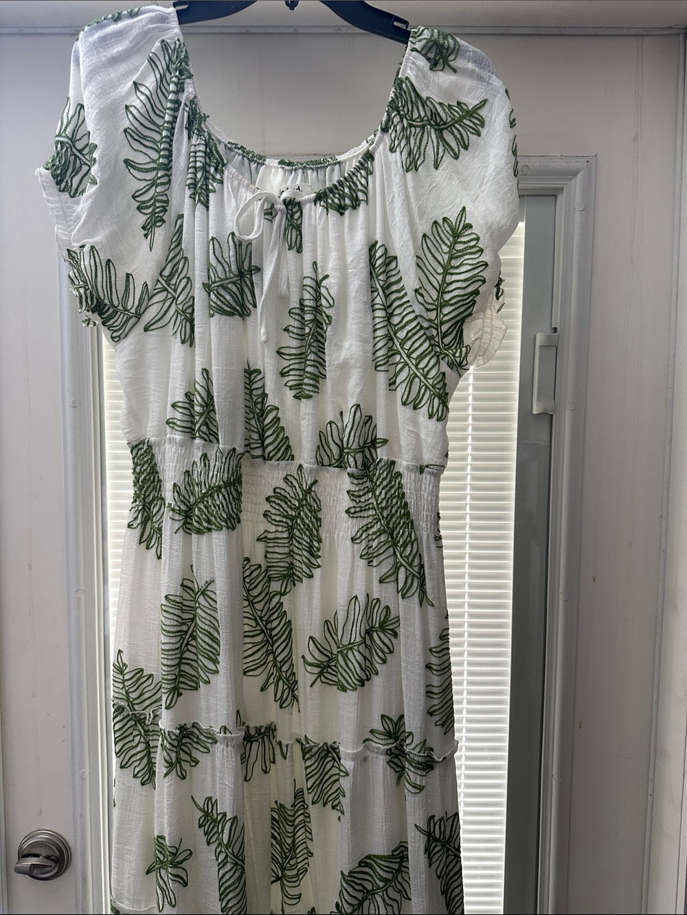 White Maxi Dress with Green Leaf Motif and Tie Neck